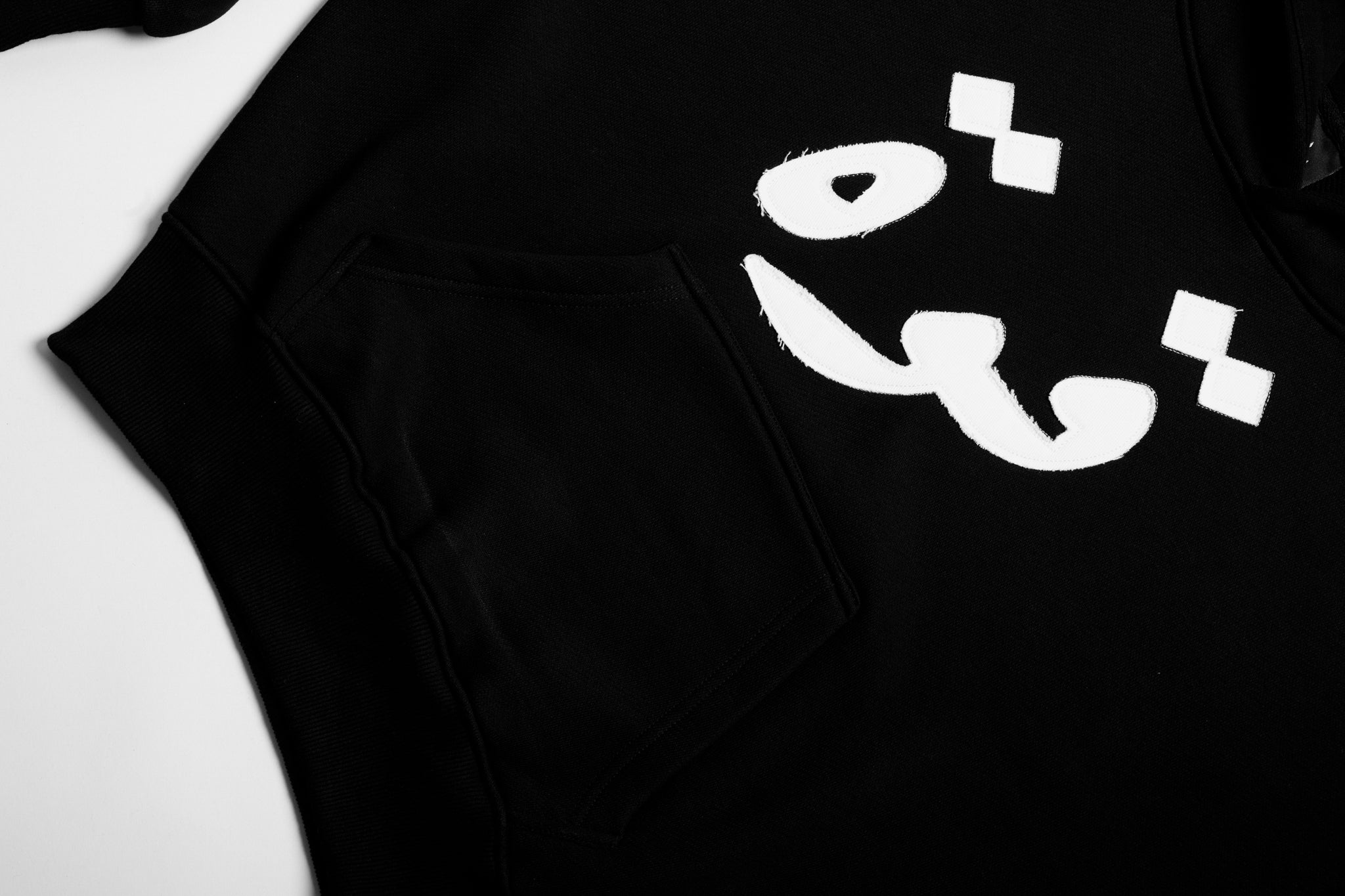 Boxy Schnitt Hoodie - Black with White "قوة" Fabric Stitching