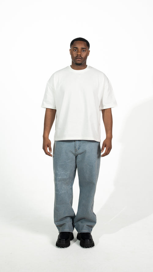 Boxy Schnitt Oversized T-Shirt – Cream White with "لا شيء مستحيل" Embroidery